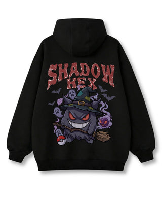 Shadow Hex oversized hoodie in black – grinning witch-hat ghost on a broom