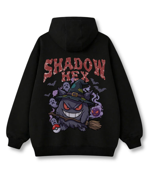 Shadow Hex oversized hoodie in black – grinning witch-hat ghost on a broom