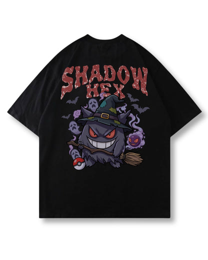Shadow Hex oversized shirt in black – grinning witch-hat ghost on a broom