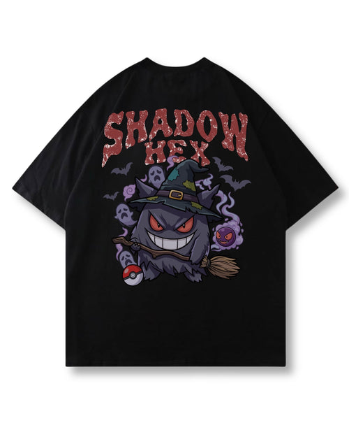Shadow Hex oversized shirt in black – grinning witch-hat ghost on a broom